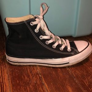 Black and white high top converse